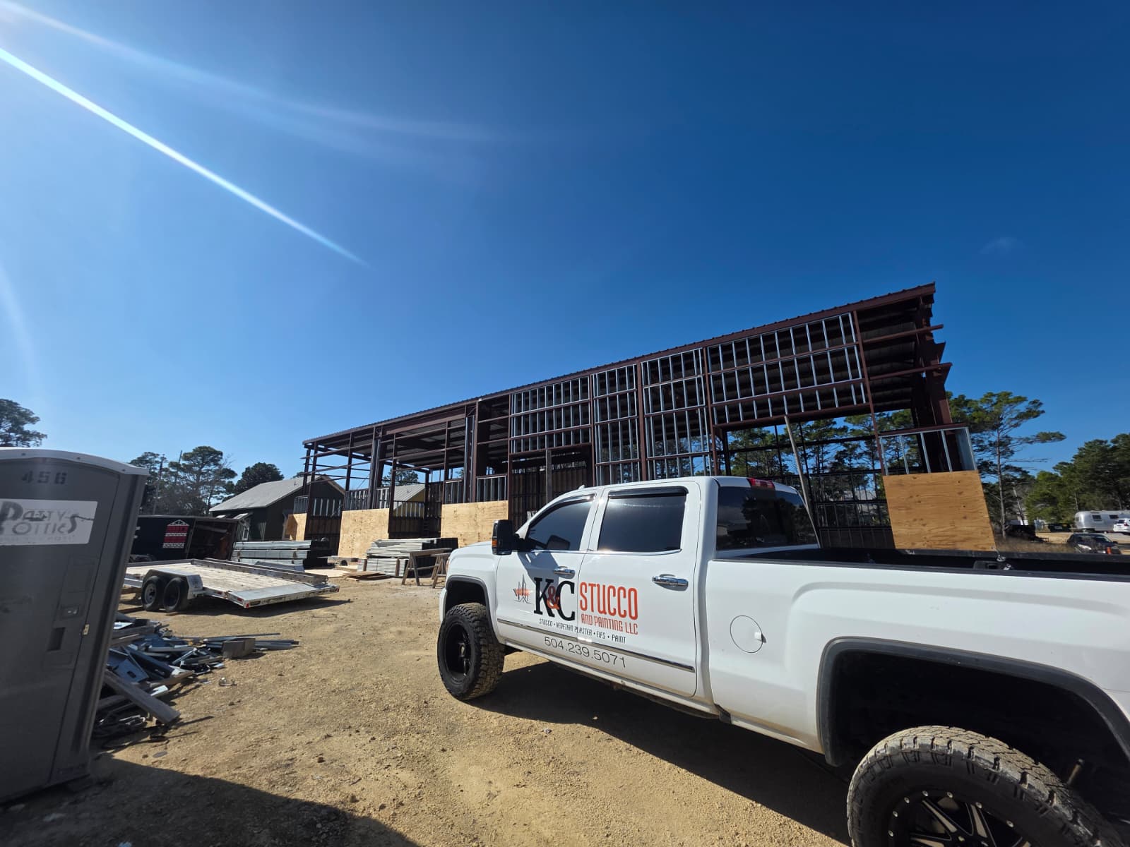 Beachfront estate with pool and stucco arches