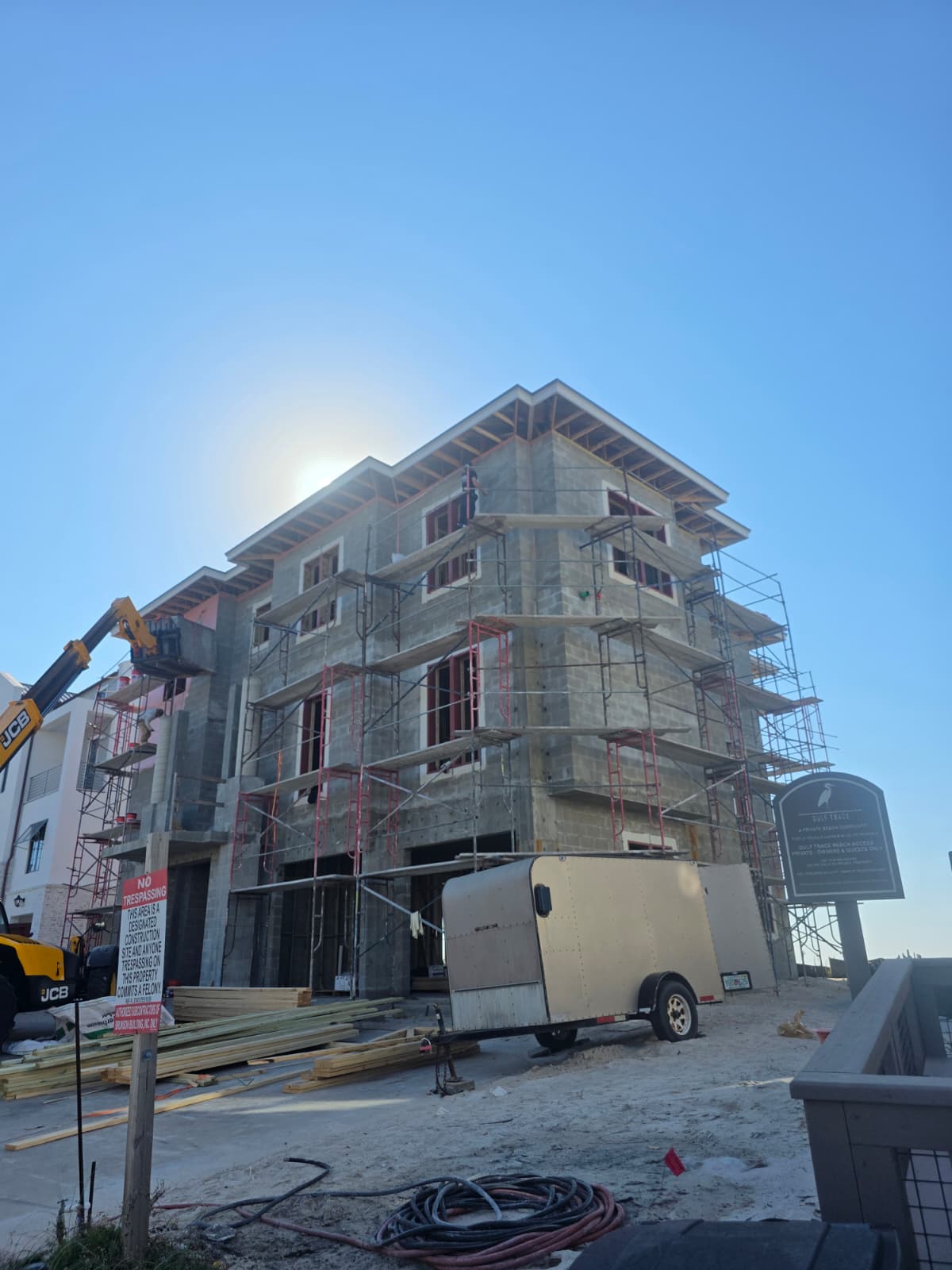Residential stucco repair - crew on scaffolding