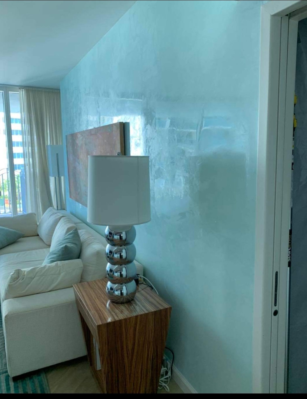 Venetian plaster luminous blue-green wall